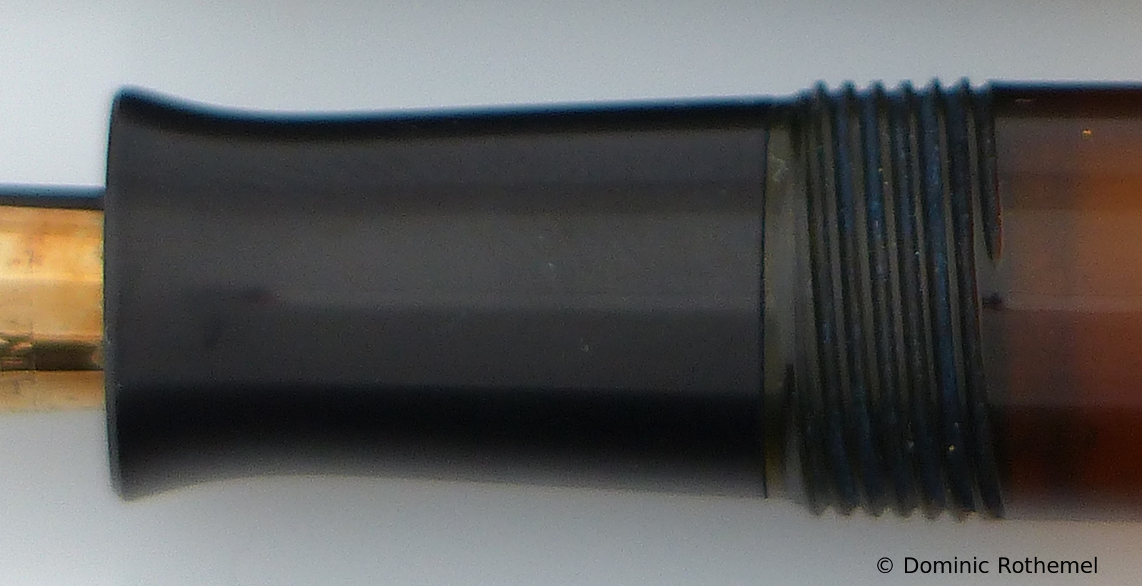 Ebonite tapered grip section