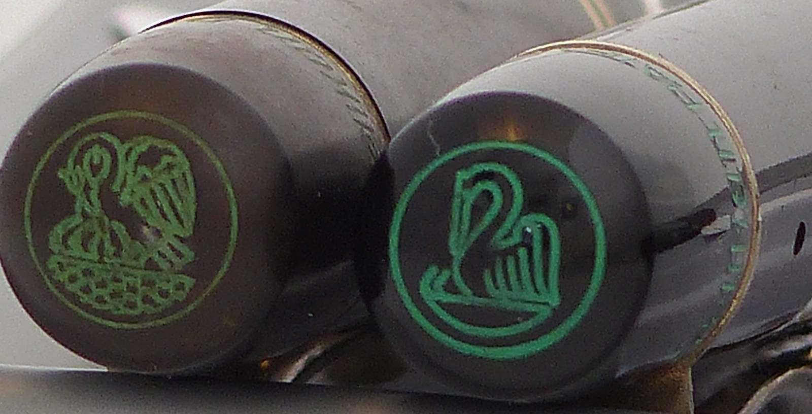 left; old 4-chick logo, right; 2-chick logo as of 1937